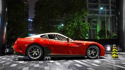 Фото автомобиля марки Ферари серо красного цвета